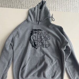 Gildan Gray Hoodie with 'Raise Lions Not Sheep' Lion Graphic